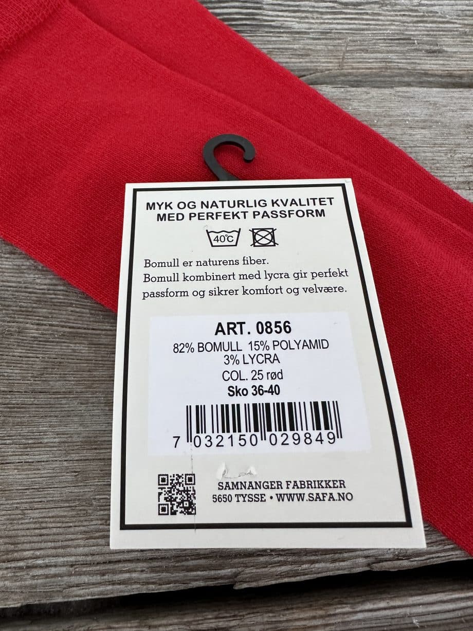 Rød knestrømpe med etikett